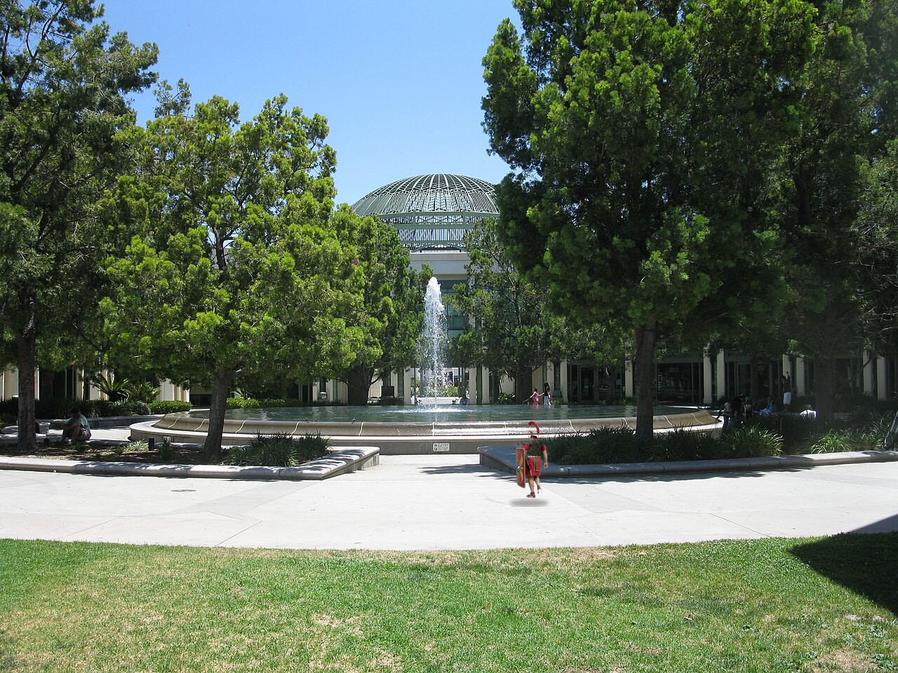 Escondido City Hall civic plaza: fountain, trees, and the city hall dome