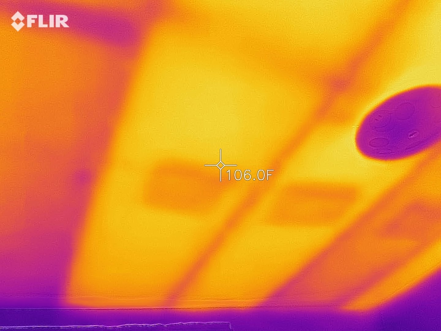 A thermal camera shows gaps in ceiling insulation. Gaps like these are what an insulation inspection is meant to catch.